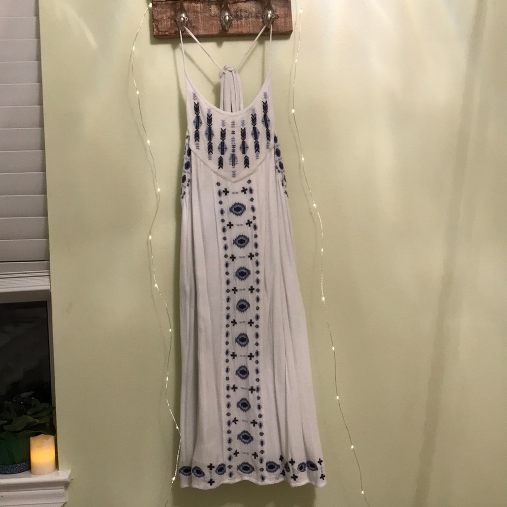 White mini dress with blue embroidery